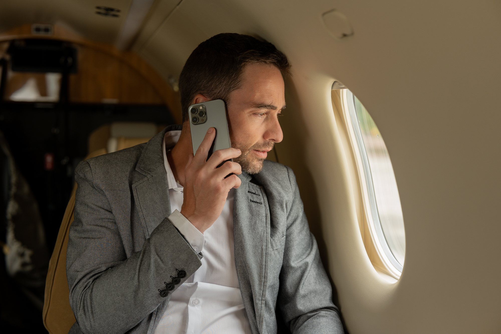 Executive travelling on a private charter plane