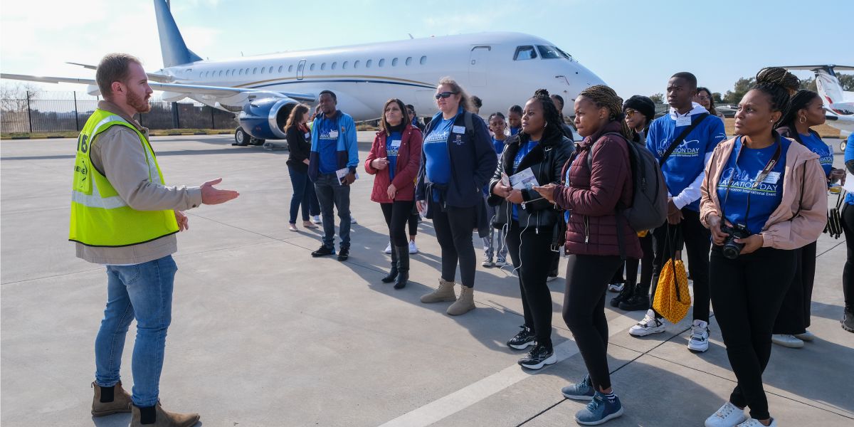 Grade 11 and Grade 12 schoolgirls and chaperones and engineering students from WITS Grade 11 and Grade 12 schoolgirls and engineering students from WITS enjoying GIA Day